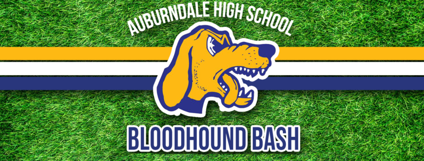 Logo of the Auburndale High School Bloodhounds with grassy background