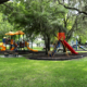 Playground equipment and sitting areas at Rev. Earl Wright Park