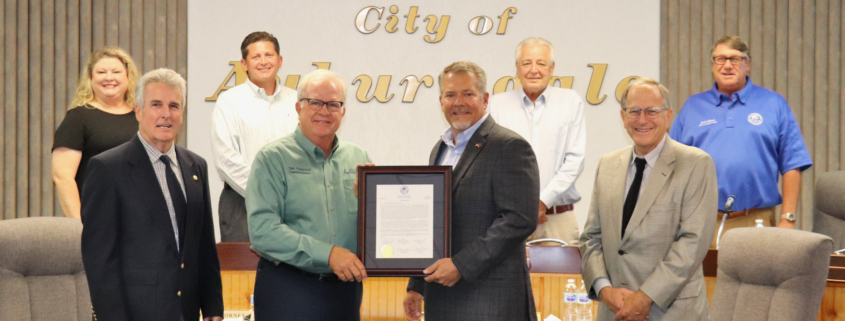 Auburndale City Commission poses with Lakeland City Manager and Mayor